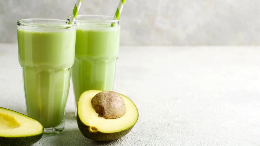 How to prevent blood clots naturally 4 Two avocado pieces and two avocado juice glasses