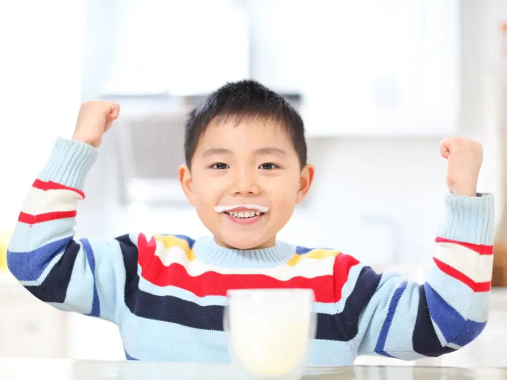Boy with milk glass
