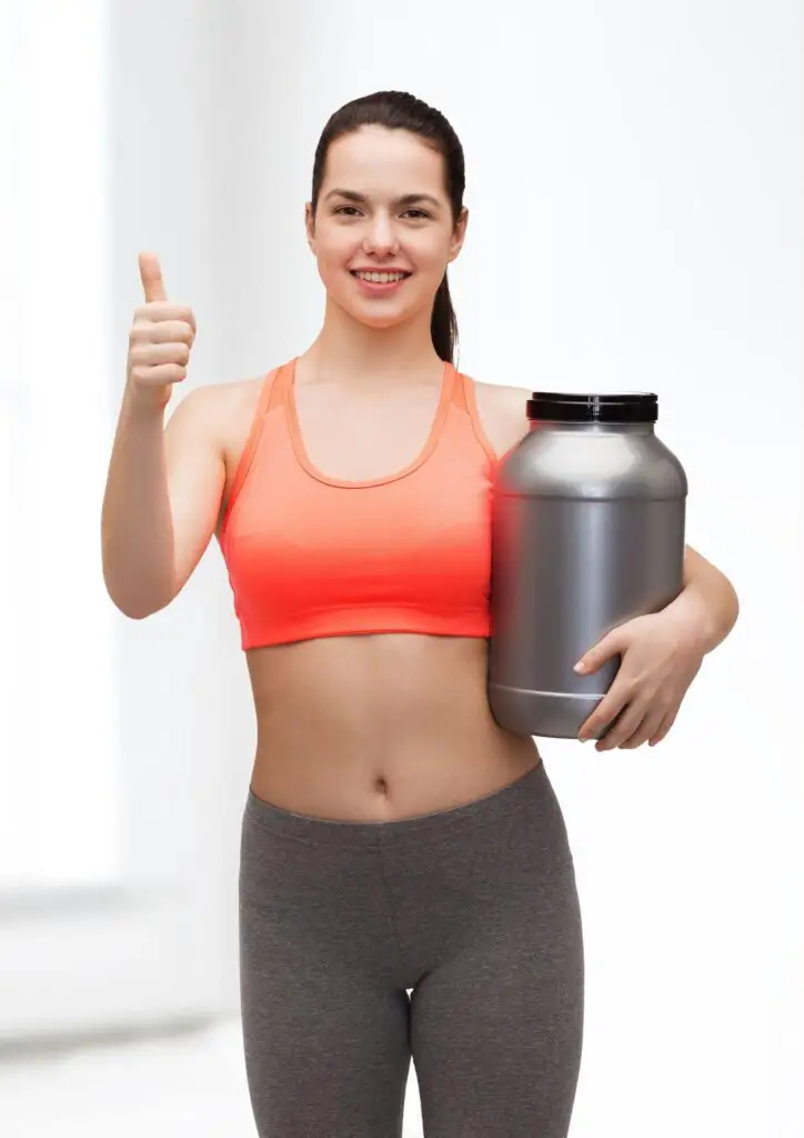 Lady with protein powder bottle