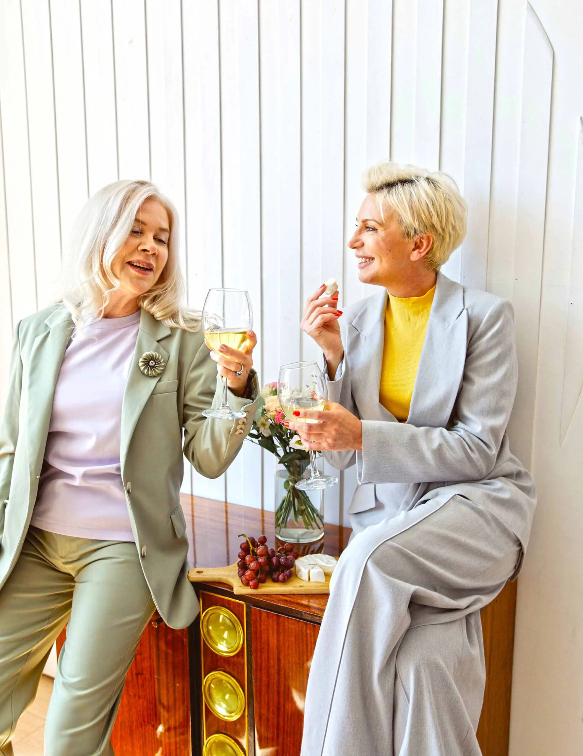 Two women drinking together